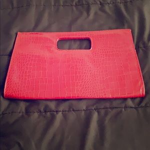 Red snake skin clutch